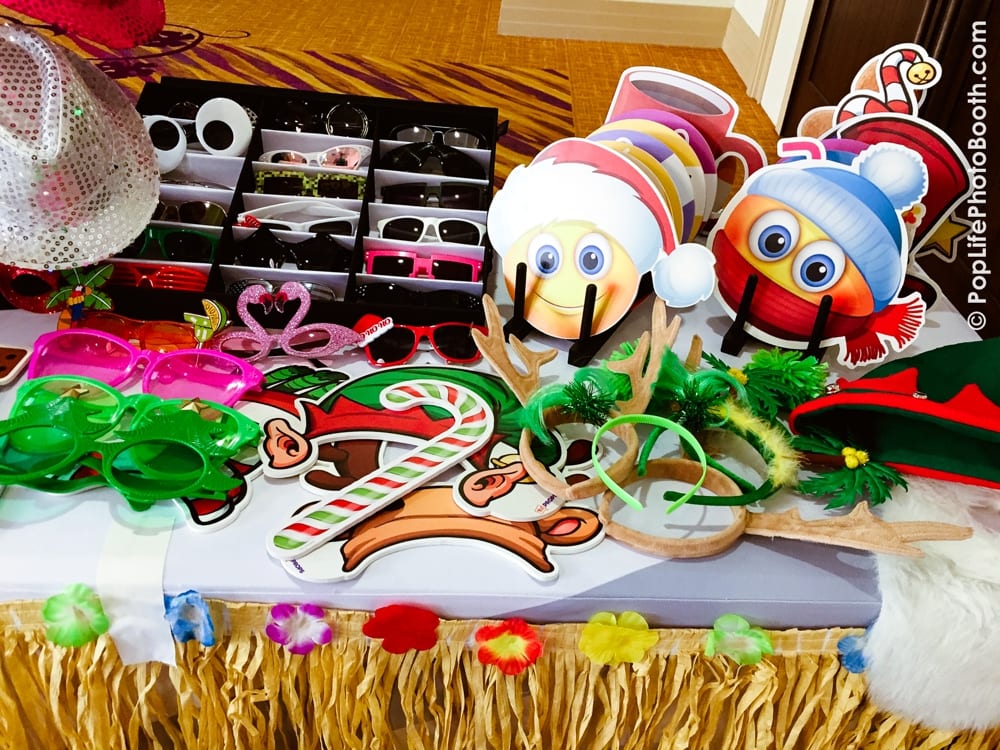 Colorful photo booth props including oversized glasses, festive hats, and playful masks, ideal for enhancing a casino-themed party atmosphere.