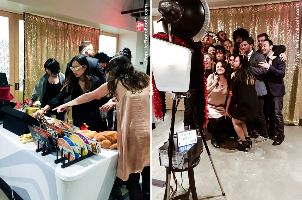 Guests enjoying Thanksgiving-themed props at a photo booth, including a turkey hat and glasses, with a festive backdrop and a group posing for a photo.