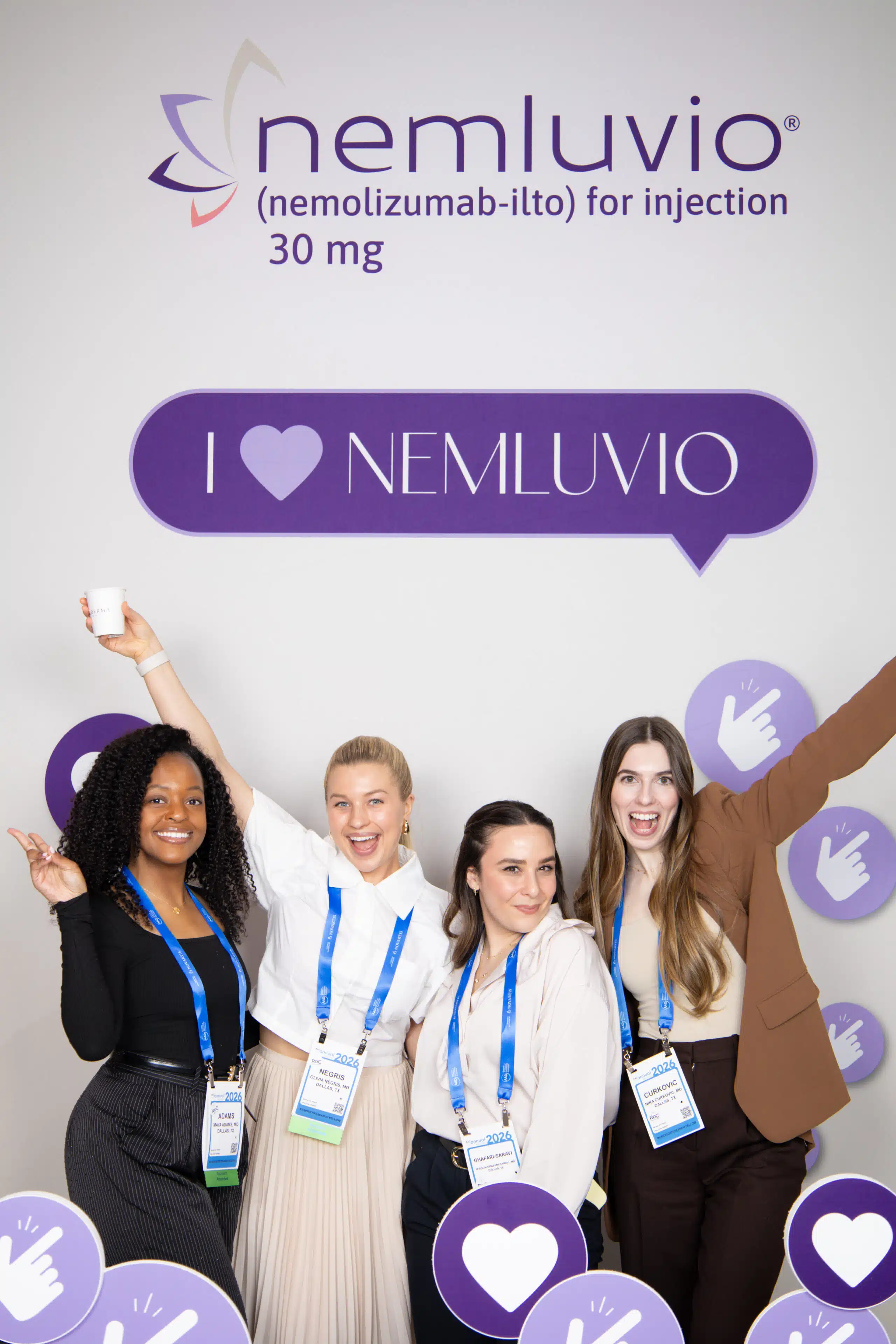Branded portrait studio experience with guests posing and sharing images instantly at an event.