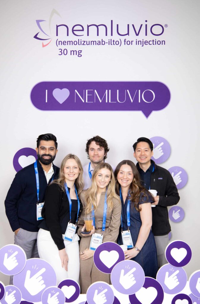 Group photo booth activation at Neiman Marcus San Francisco featuring guests and branded graphics, creating shareable content.