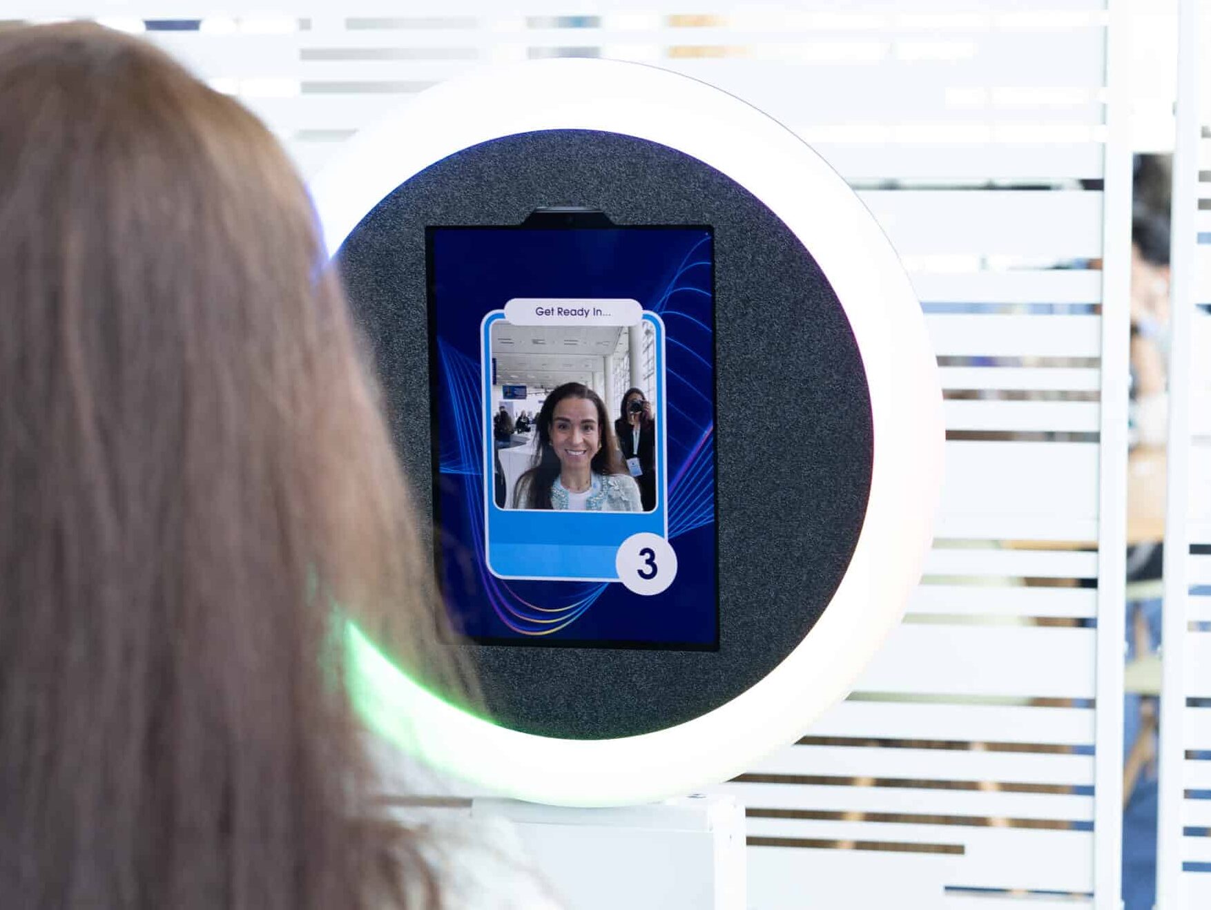 Pop Life Photo booth with AI portrait and custom card design on screen.