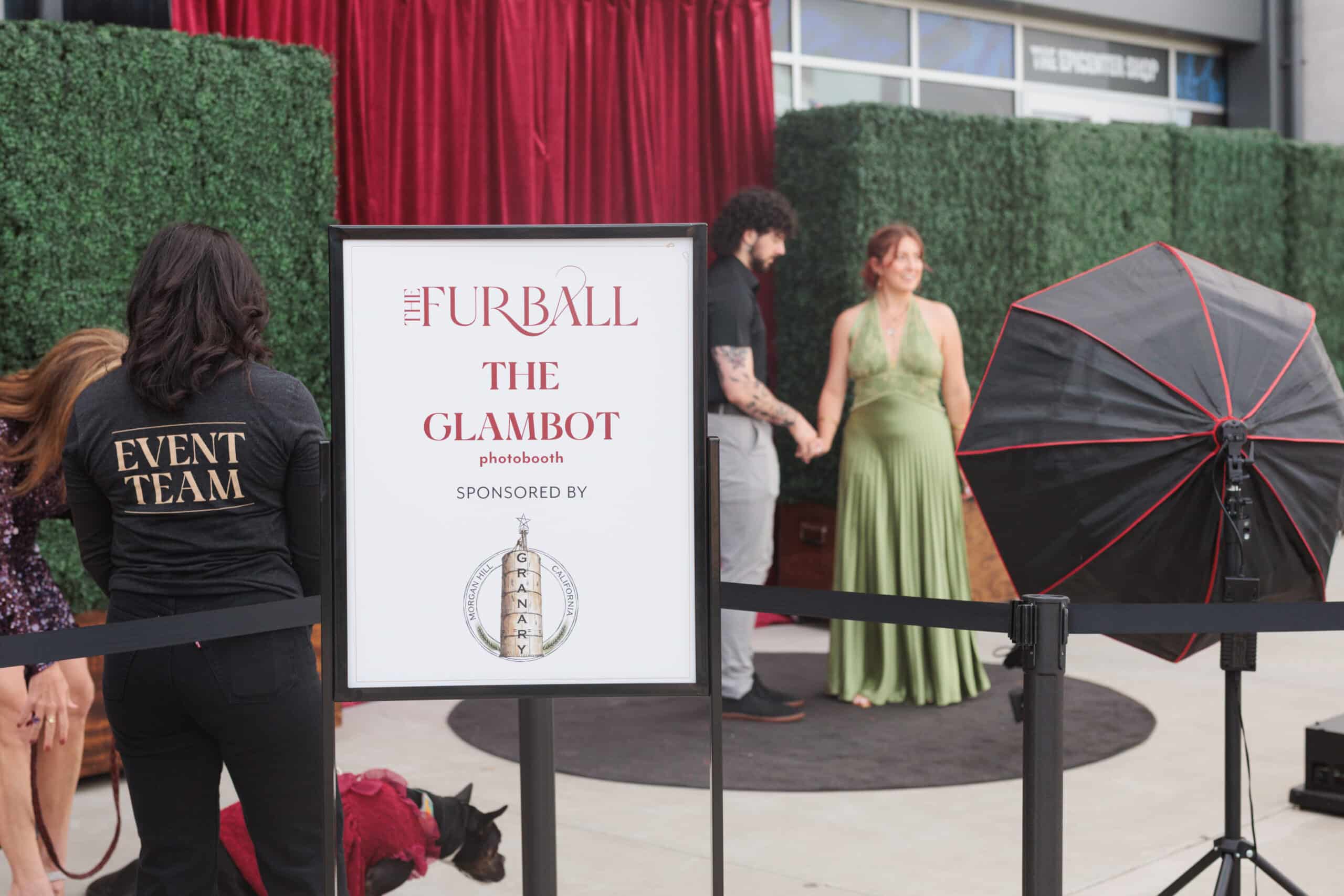 GlamBot X photo experience at The Furball gala and event team assisting guests.