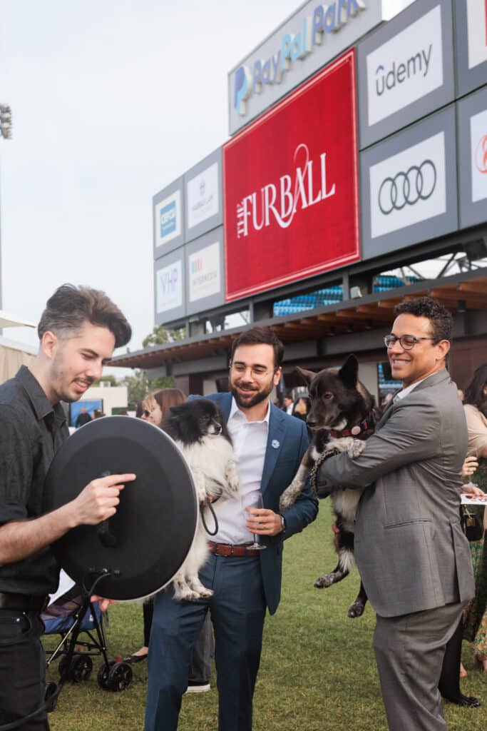 Pop Life Photo team at The FurBall event, capturing red carpet photography and interacting with guests and their dogs.