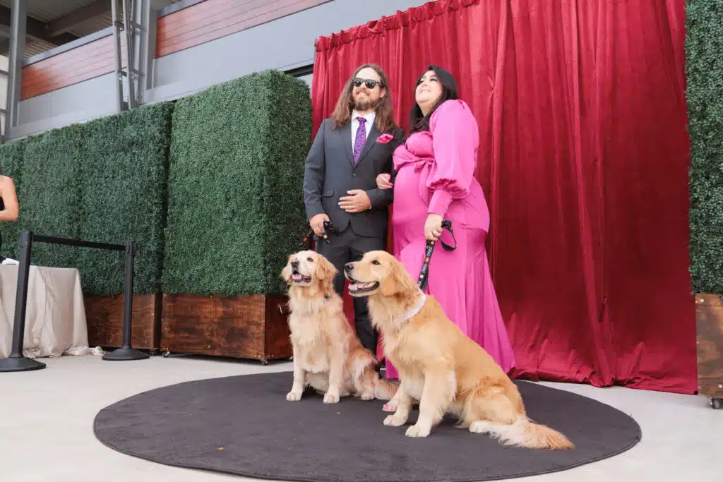 Pop Life Photo booth activation at FurBall gala in Silicon Valley, couple and their dogs posing for a photo.