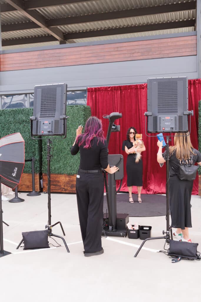 Pop Life Photo team operating themed puppy booth at FurBall event, providing coordinated activations.