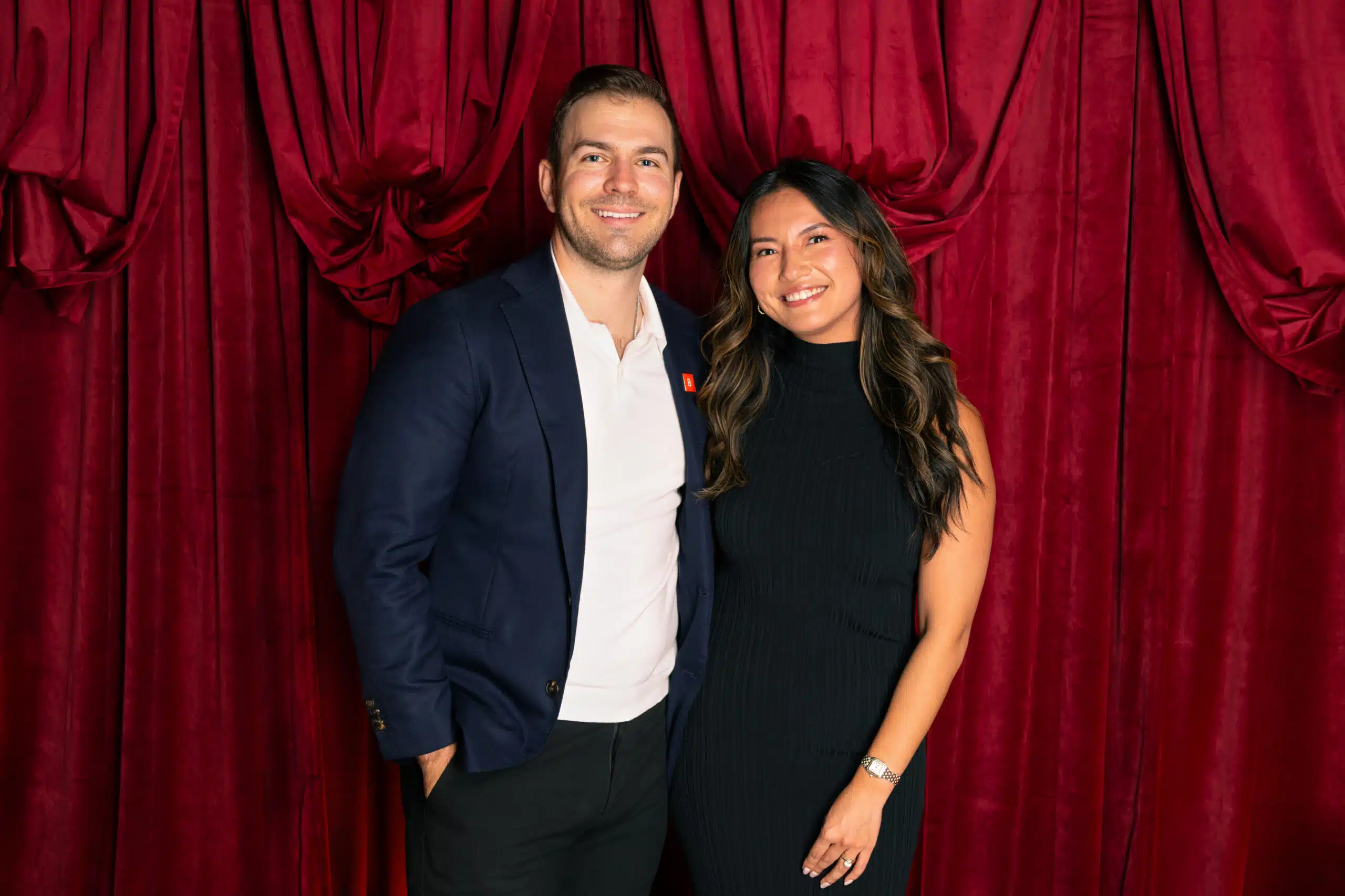 Couple posing for branded portrait photography at event, custom graphic overlays and instant digital delivery.