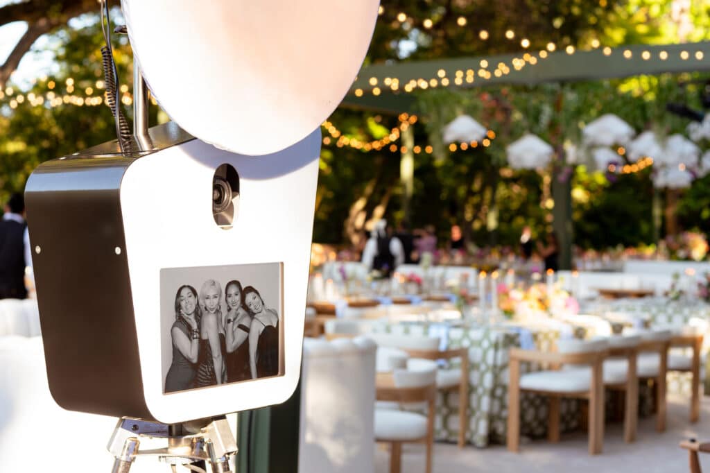 Glam photo booth experience at a wedding