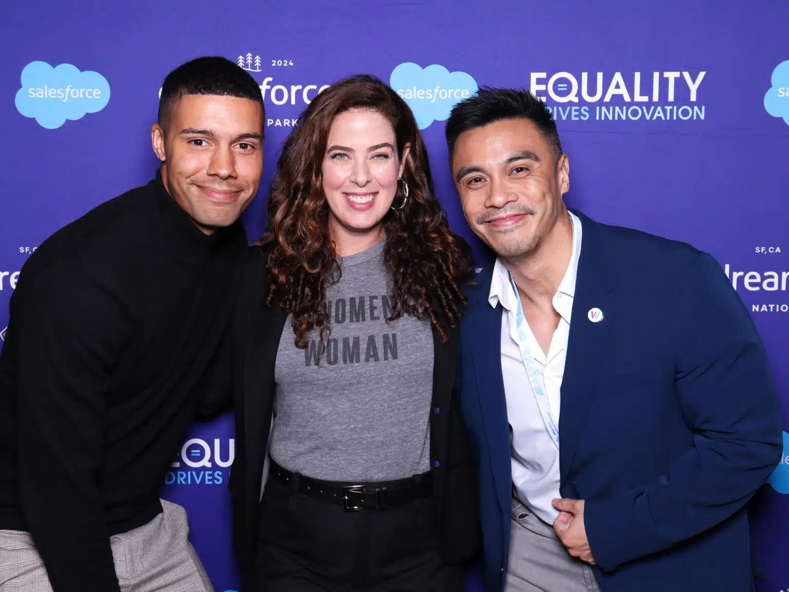 Branded photo booth experience at Salesforce Equality event with guests and custom backdrop.