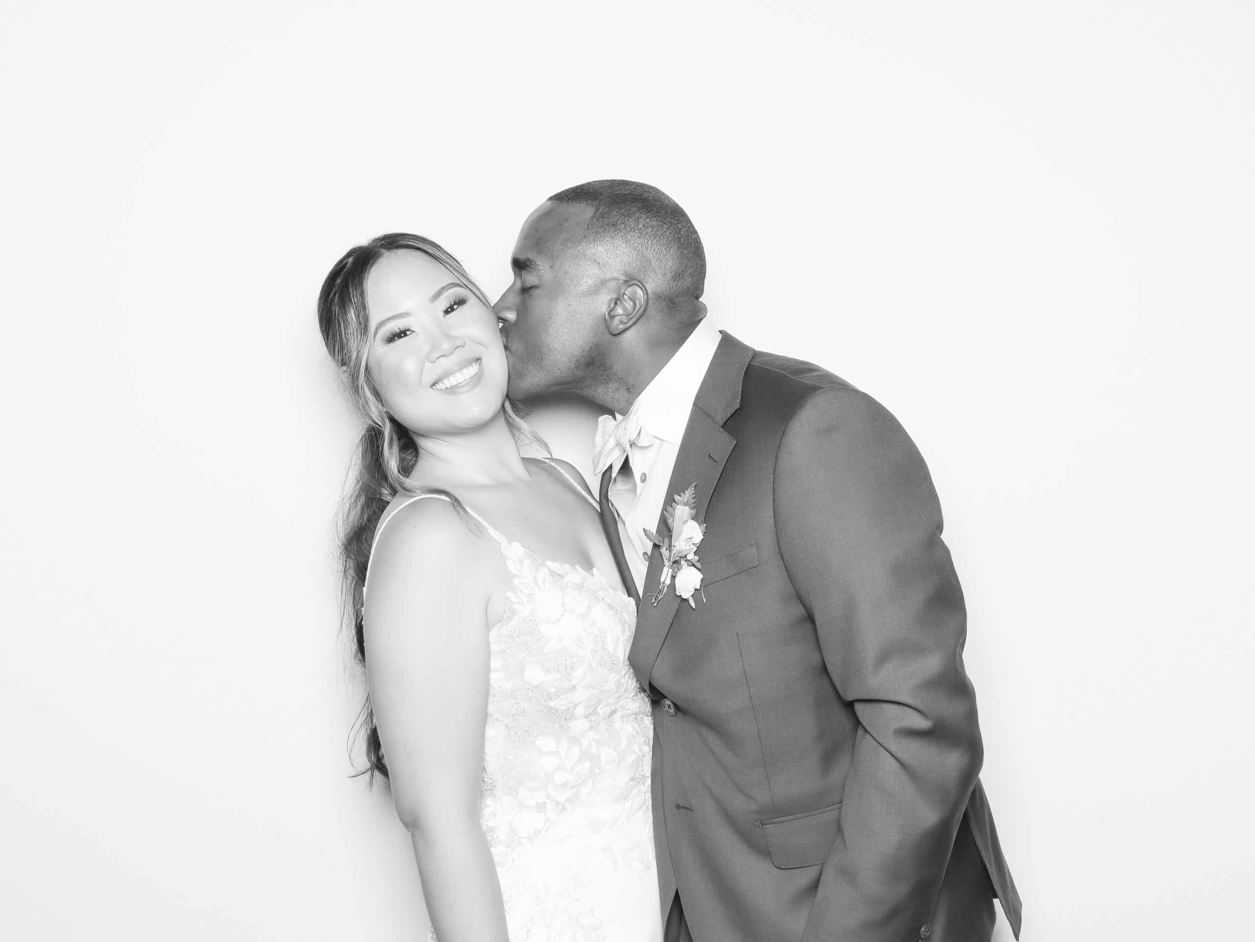 Couple posing in Glam Photo Booth, polished portraits and instant digital delivery.