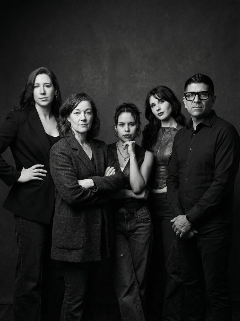 Group of five individuals in monochrome portrait, showcasing diverse styles and expressions, embodying urban creativity and artistic themes relevant to Pop Life Photo's unique event experiences.