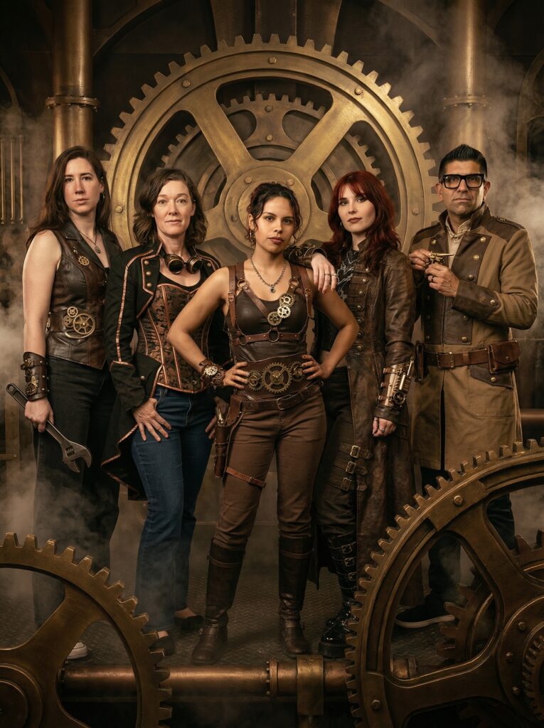 Group of five individuals dressed in steampunk-inspired outfits, posing confidently with gears and smoke in the background, emphasizing fantasy and pop culture themes.