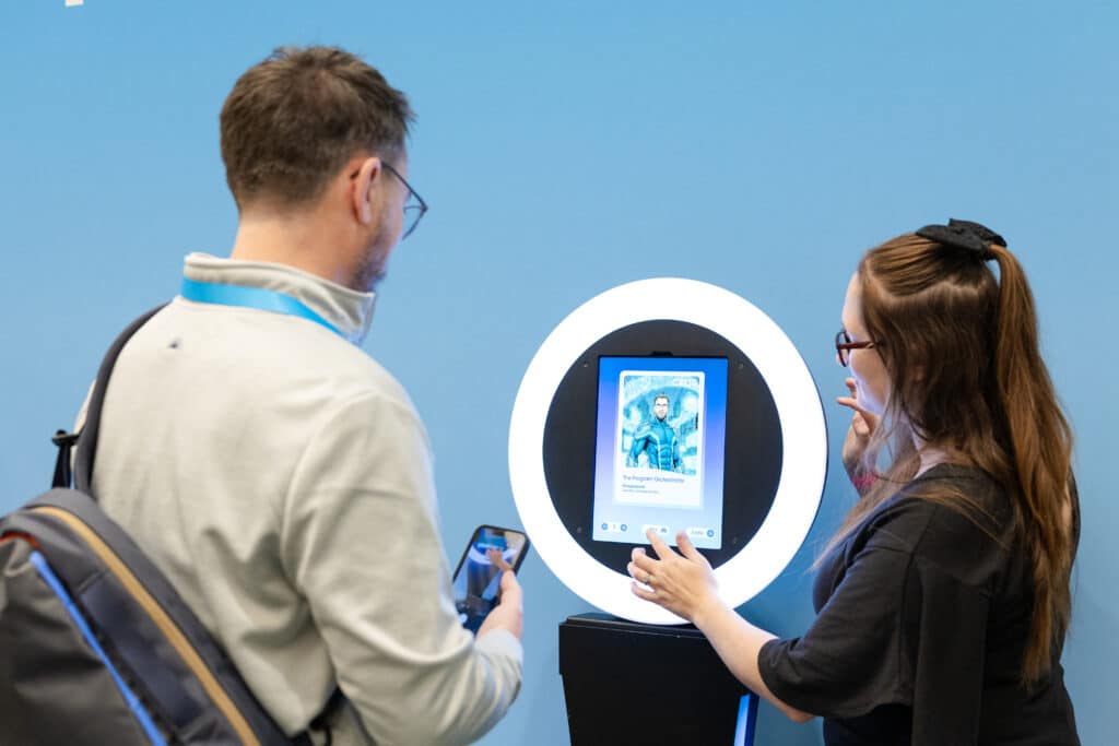 guests receives custom AI trading card through ring light booth