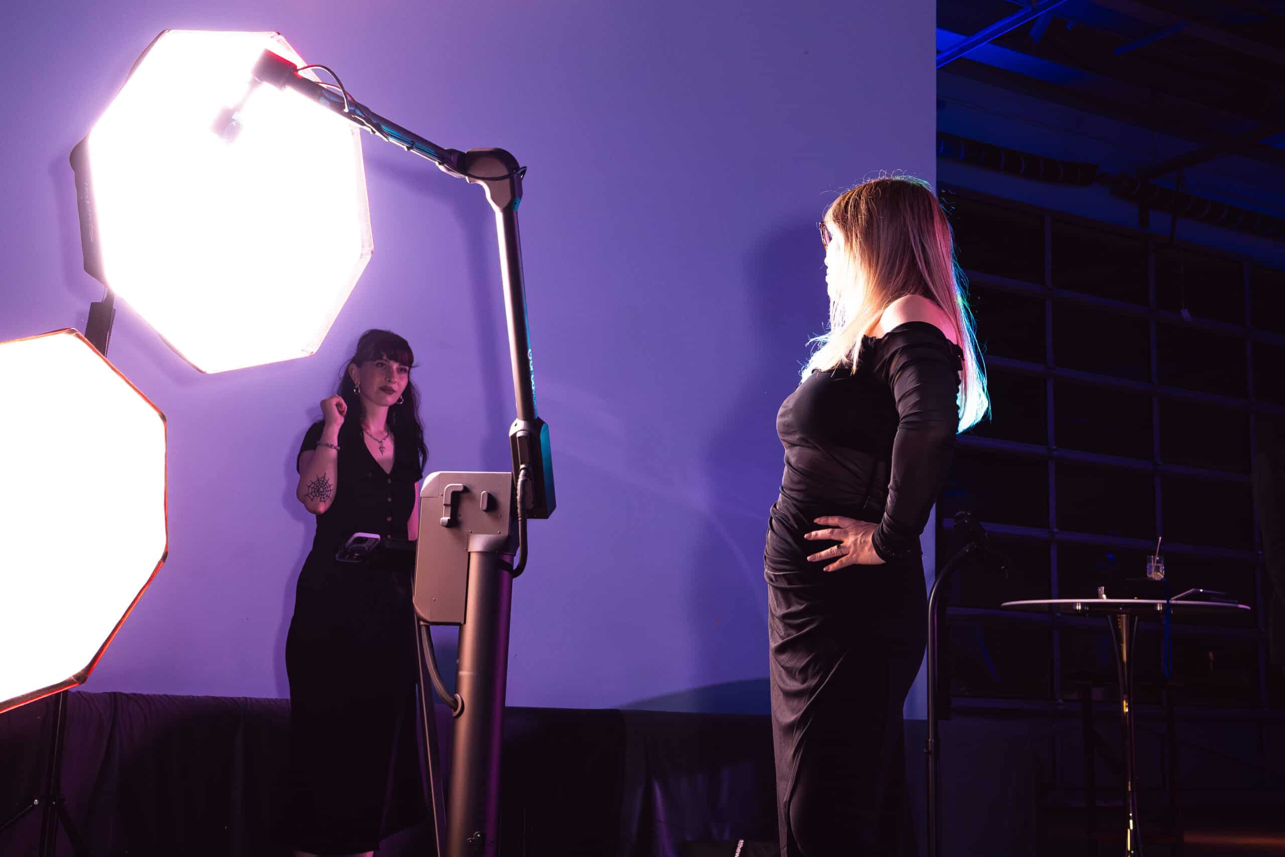 Woman taking a photo with a glam bot