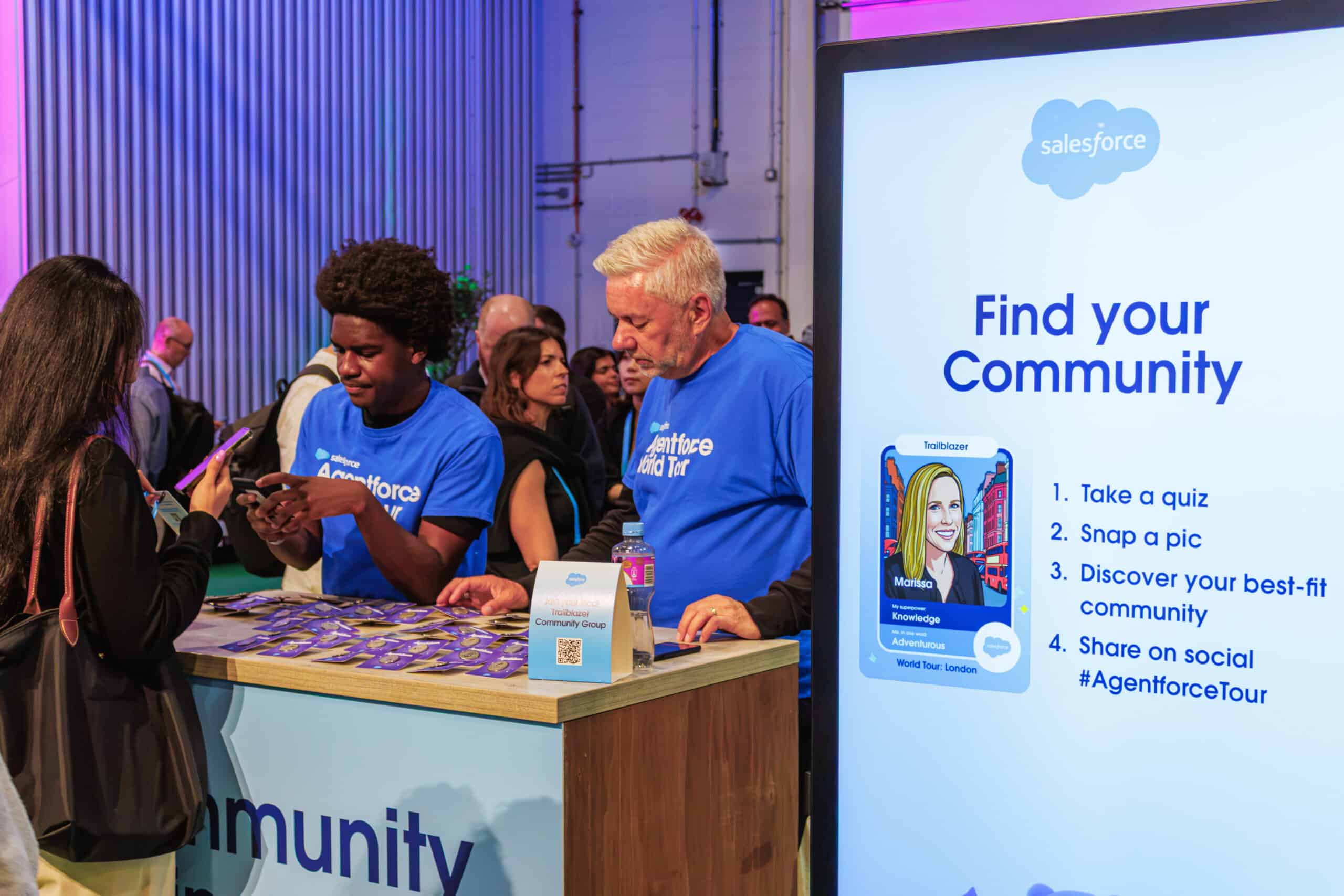 Salesforce World Tour London activation, AI trading card photo booth, attendees and staff.